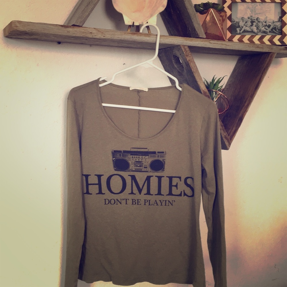 Long sleeved, cheeky shirt.